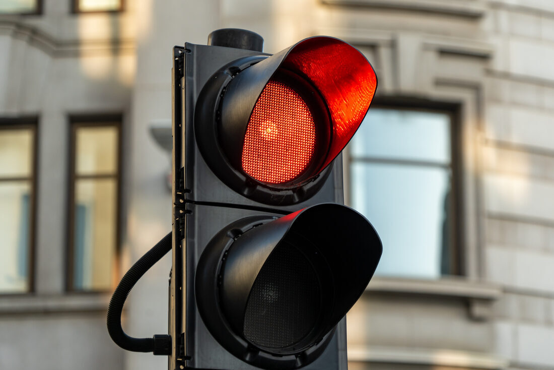 A traffic light on red