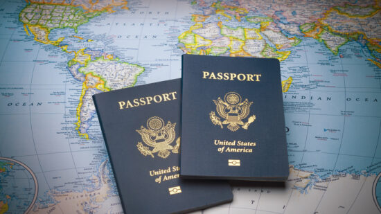 Passports on a map of the world